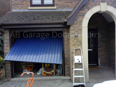 cable snapped on up and over garage door in Beeston